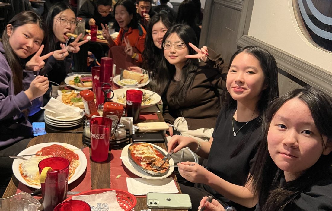 Students posing at Ralph’s Tavern for dinner.